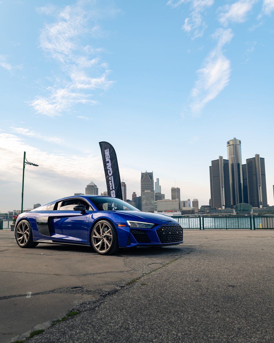 Audi R8 on display at Cars for a Cause with the Detroit skyline behind it